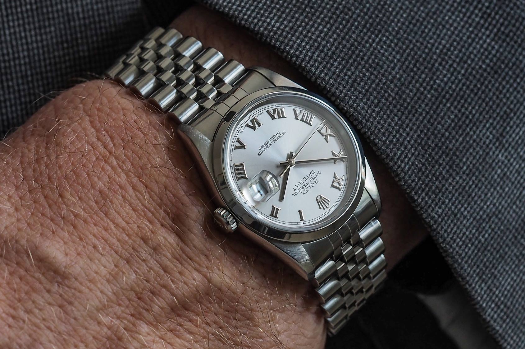 rolex datejust on wrist