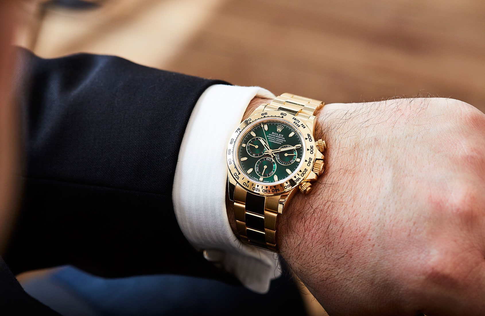 rolex daytona gold green price