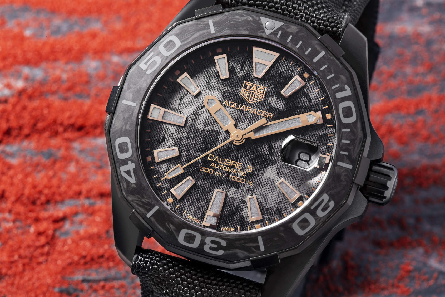 INTRODUCING Altered carbon the TAG Heuer Aquaracer 300M Carbon Collection