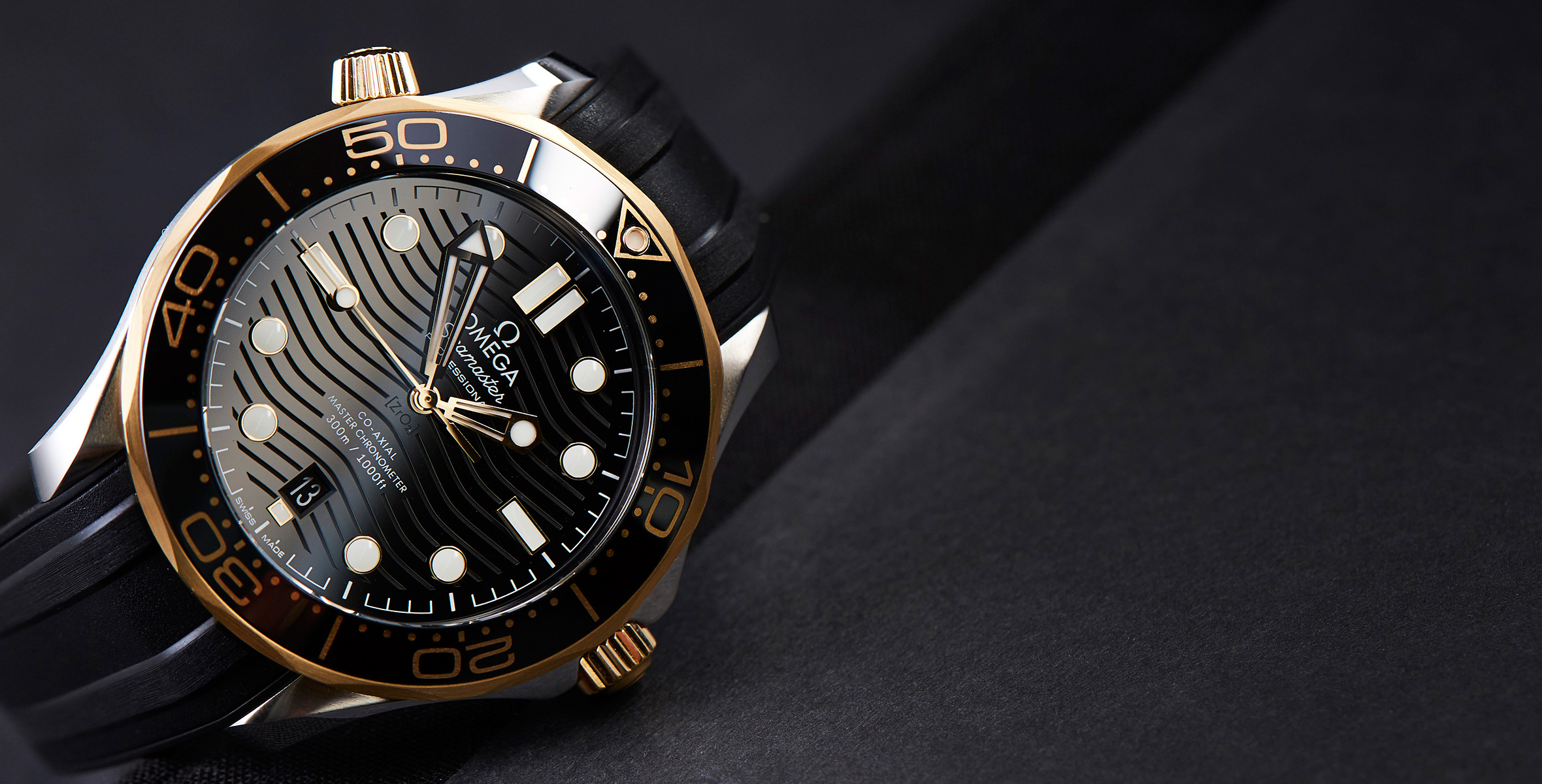 omega seamaster 300 black and gold