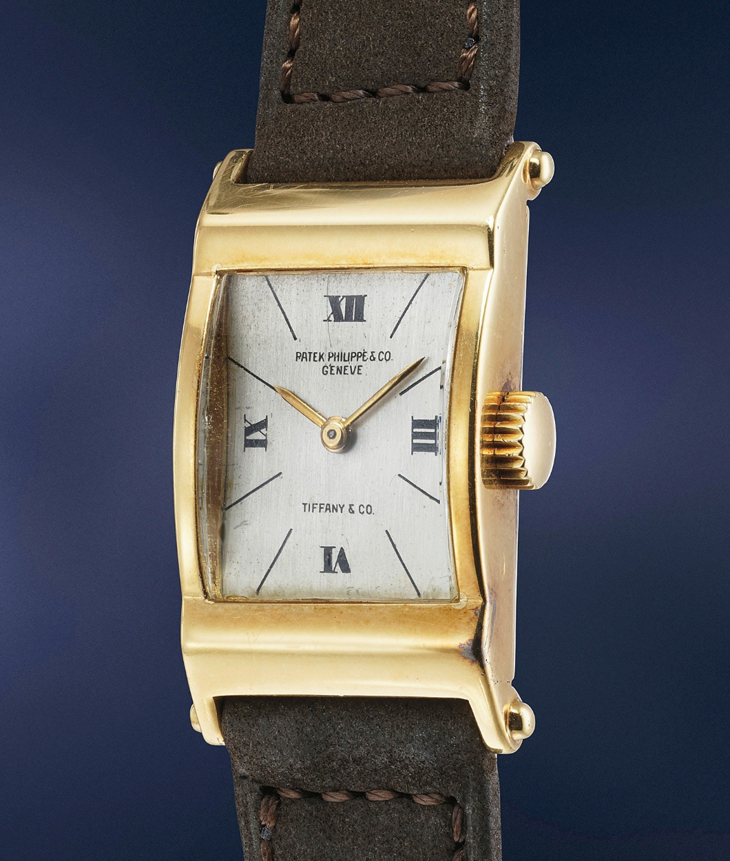 Sold at Auction: PATEK PHILIPPE, PATEK PHILIPPE A burgundy leather