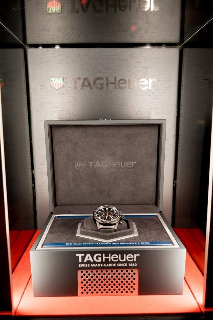 EVENT: Hemsworth Thors a cold Sydney night auctioning watch for charity at TAG Heuer ’55 Years of Carrera’ Exhibition