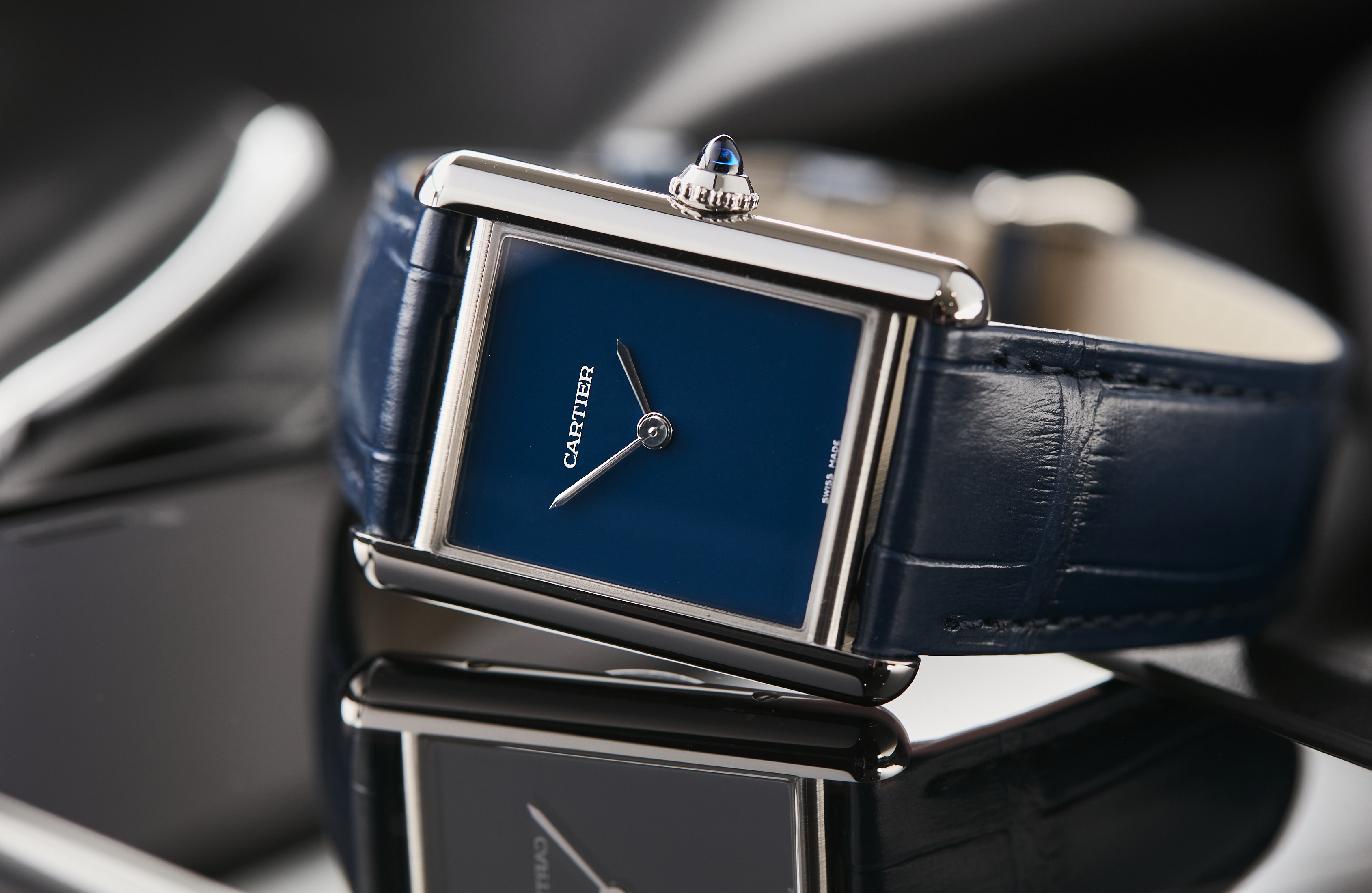 cartier tank blue dial