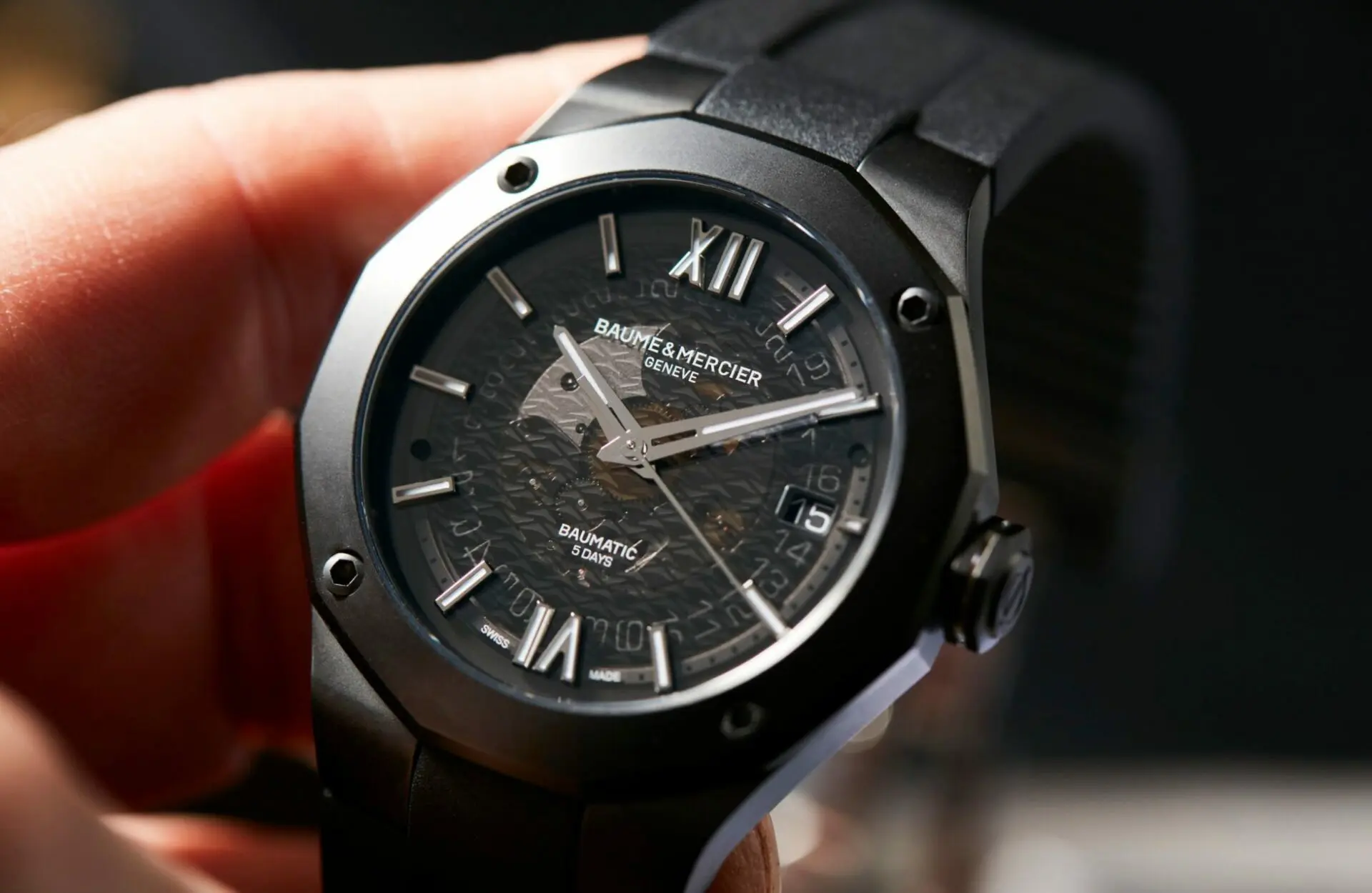 black-dial-in-hand-scaled-