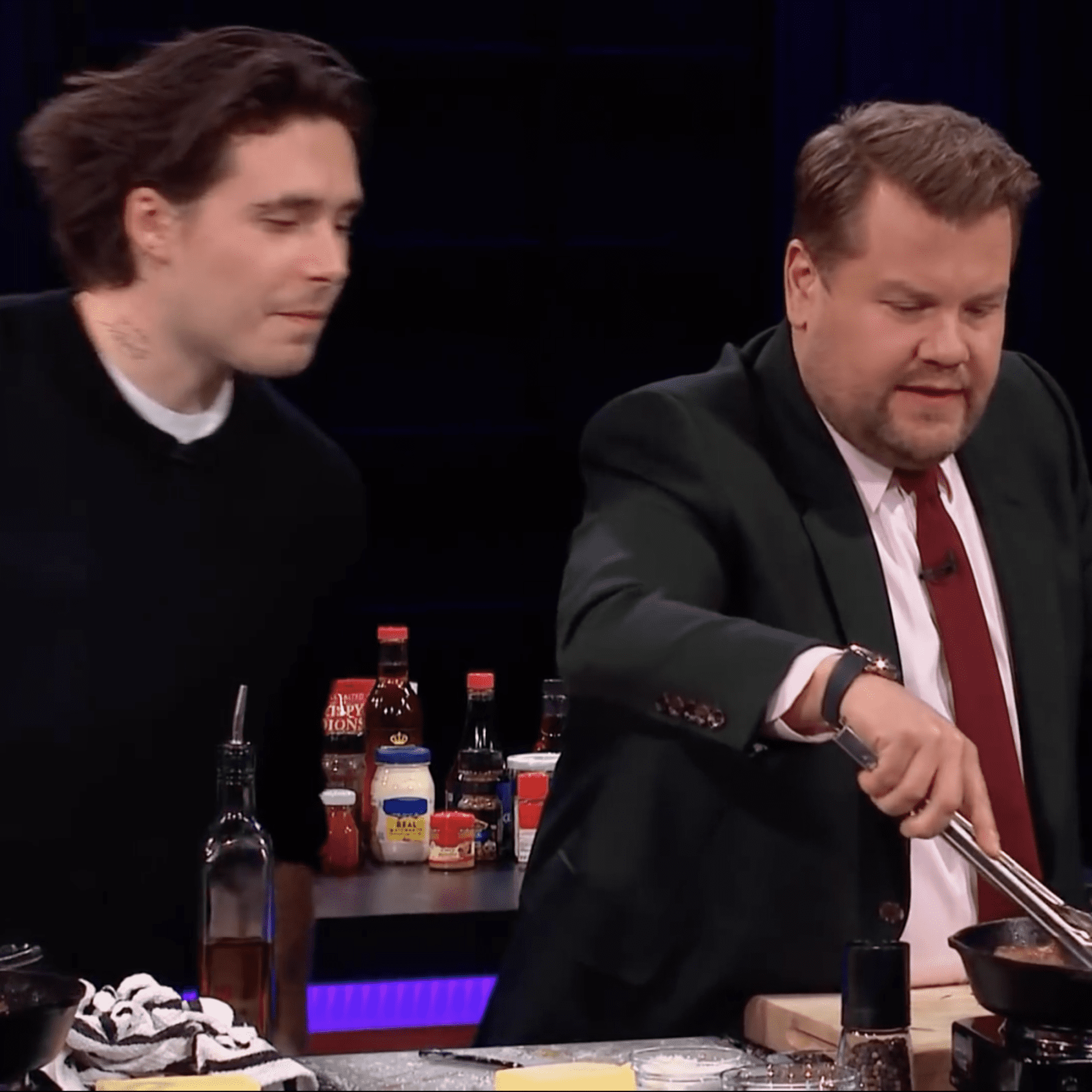 It’s Nautilus vs Aquanaut as Brooklyn Beckham & James Corden have a steak / frites cook-off while wearing Pateks