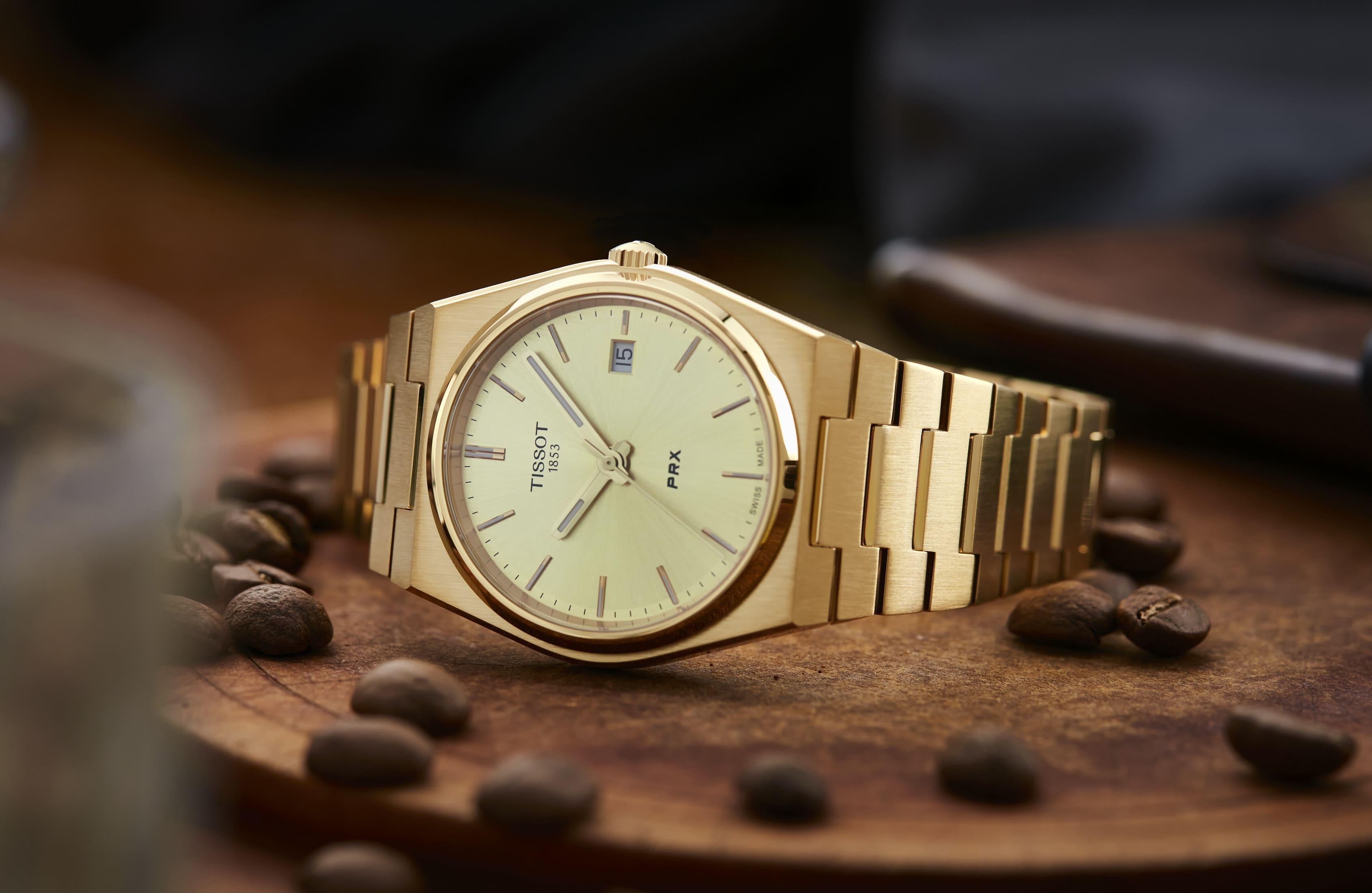 Tissot PRX watch in PVD Gold.