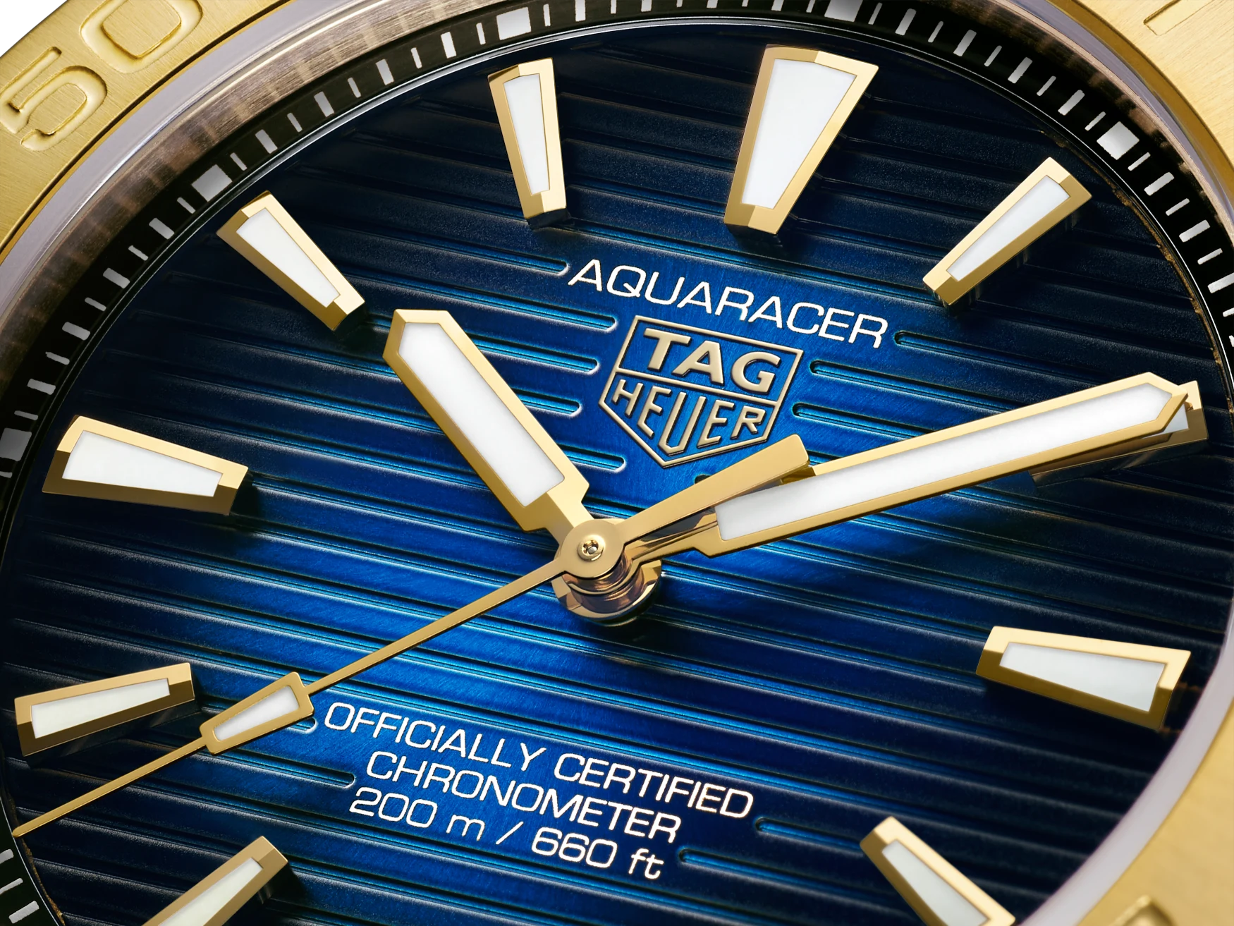 TAG Heuer Aquaracer Professional 200 Full Gold blue sunburst dial