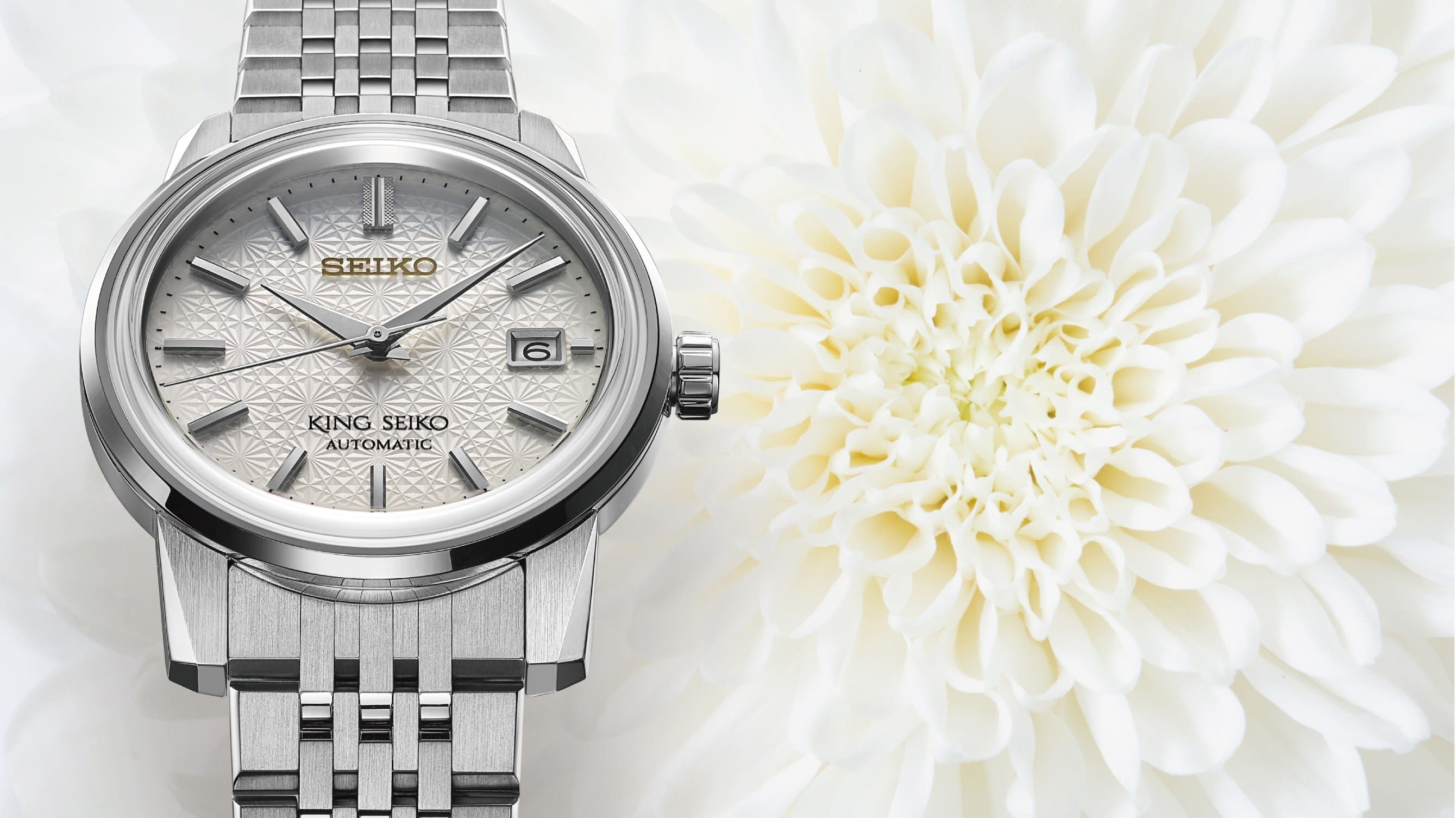 The King Seiko SJE095 takes its dial inspiration from Japan’s national flower