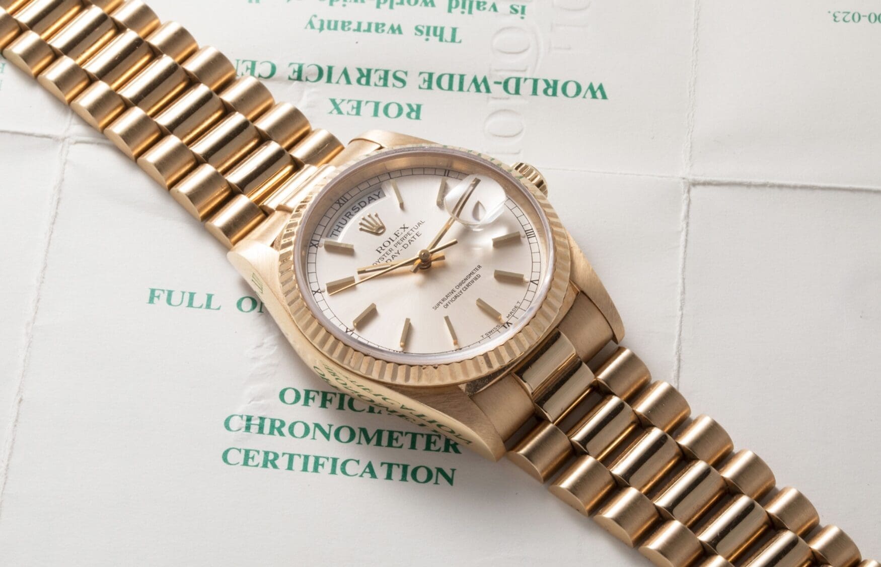 rolex day date yellow gold white dial e1691034521549
