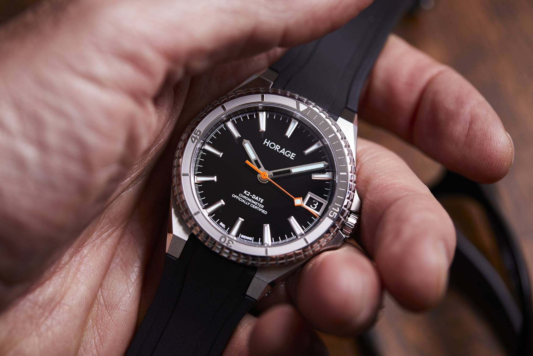 Horage Supersede Date Black Coral in hand