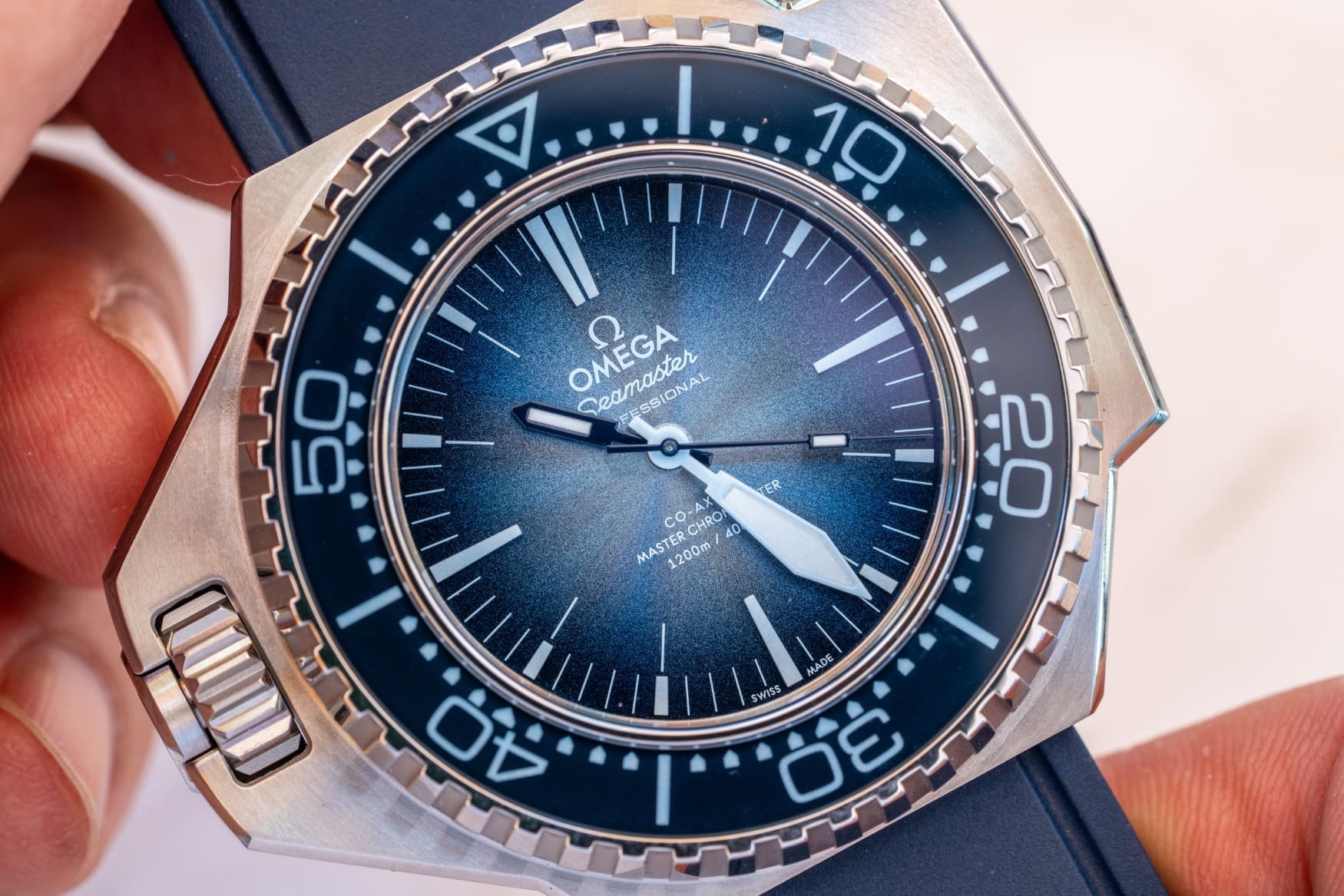 omega seamaster ploprof 1200m summer blue dial close up