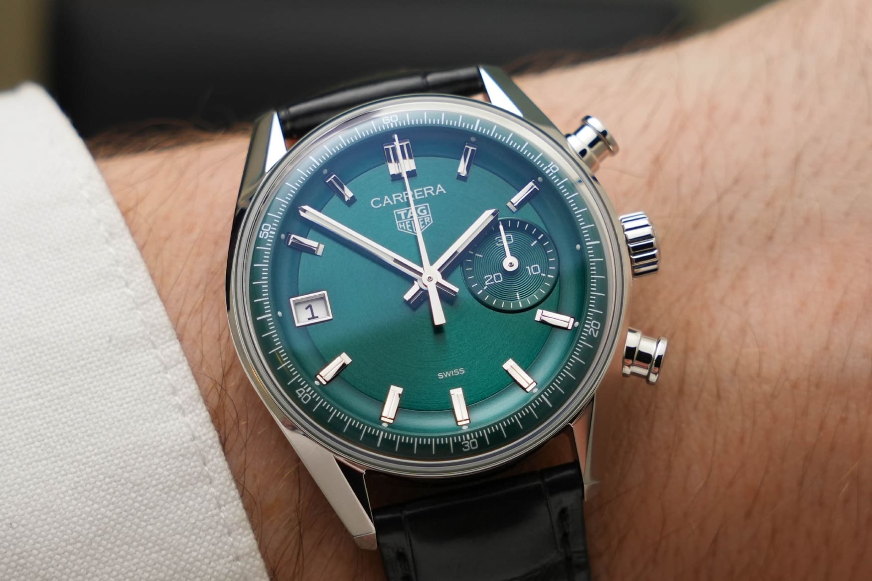tag heuer carrera dato green wrist dial close up