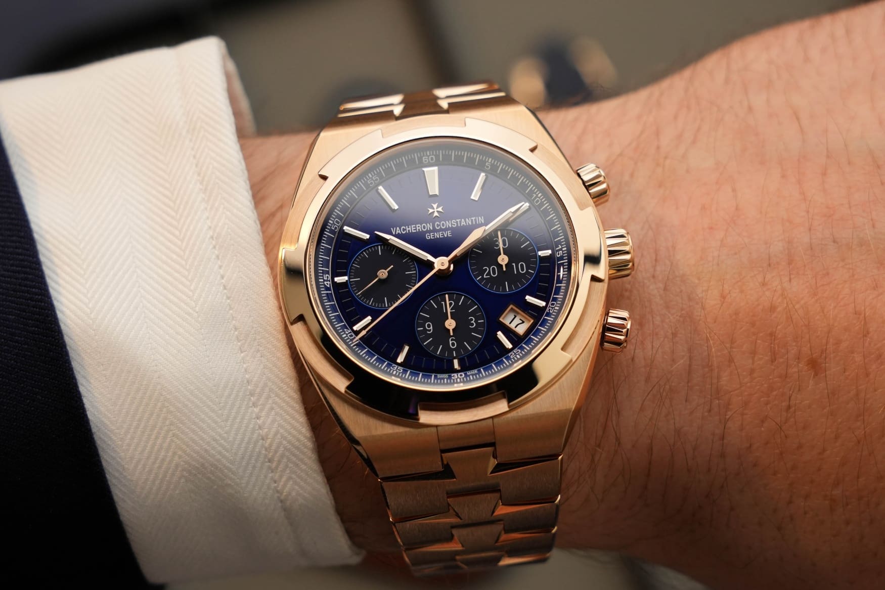 vacheron constantin overseas chronograph pink gold blue dial wrist close up