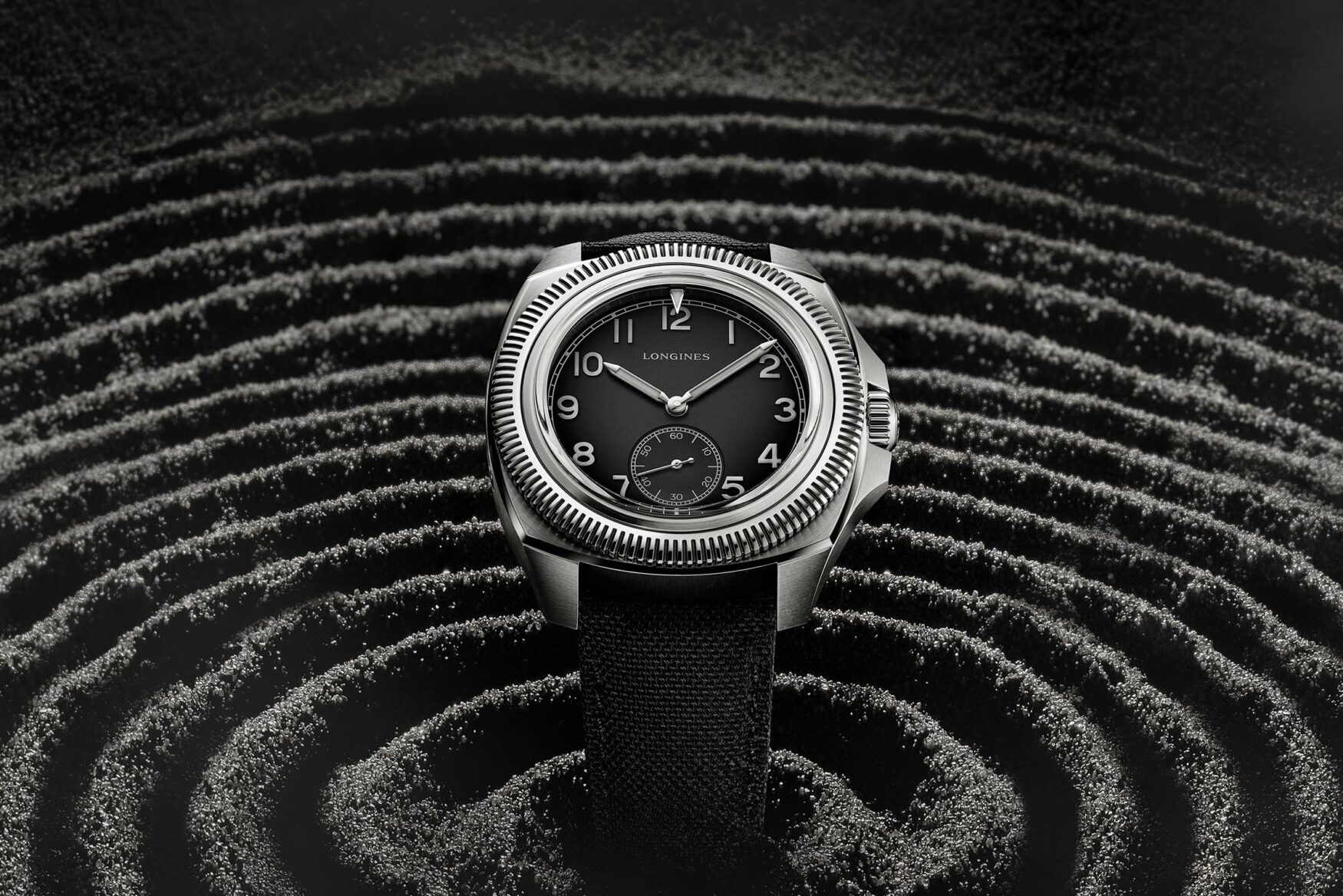 The Longines Majetek Pioneer Edition is a titanium, greyscale re-edition of a 1930s pilot watch