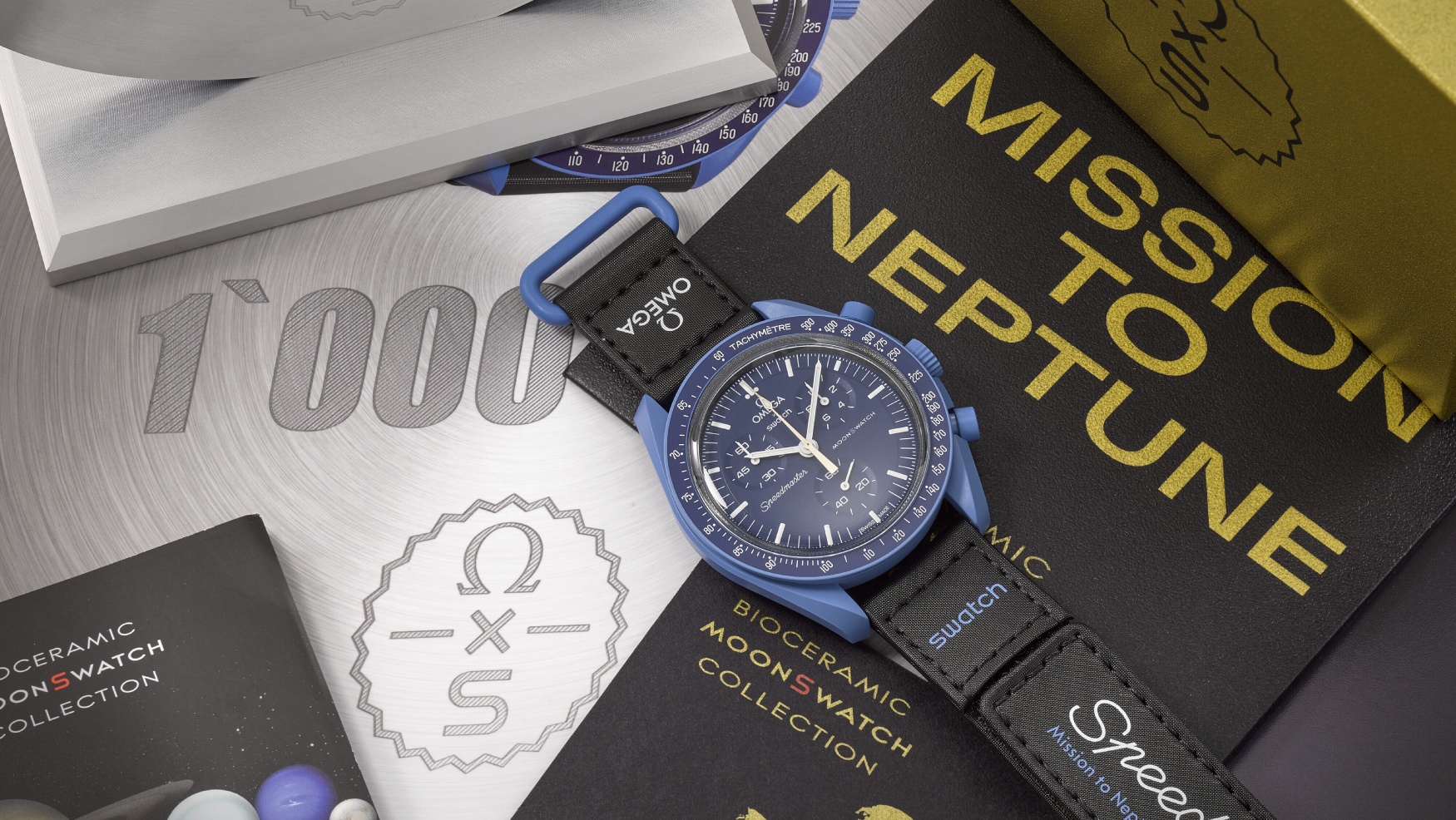 one millionth moonswatch charity auction feature