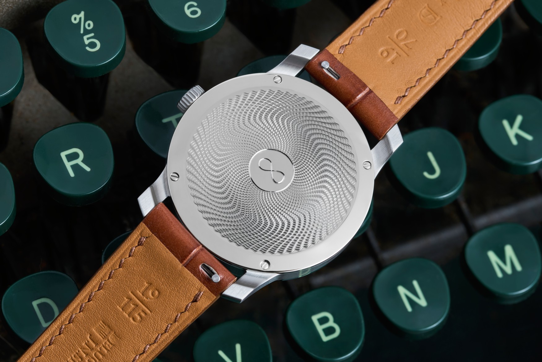 j n shapiro infinity series pure silver caseback