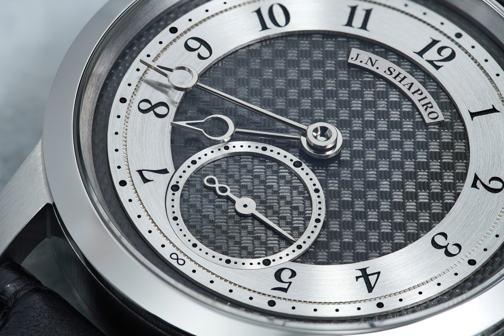 j n shapiro infinity series zirconium dial close up