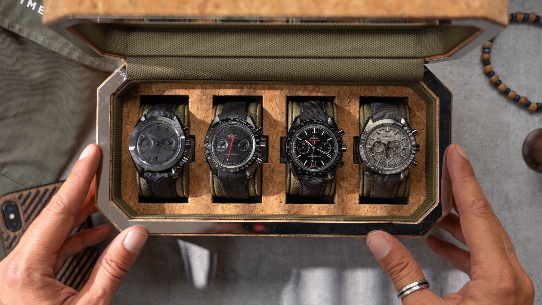 Omega debuts 4 new, slimmer “Side of the Moon” Speedmaster models in black and grey